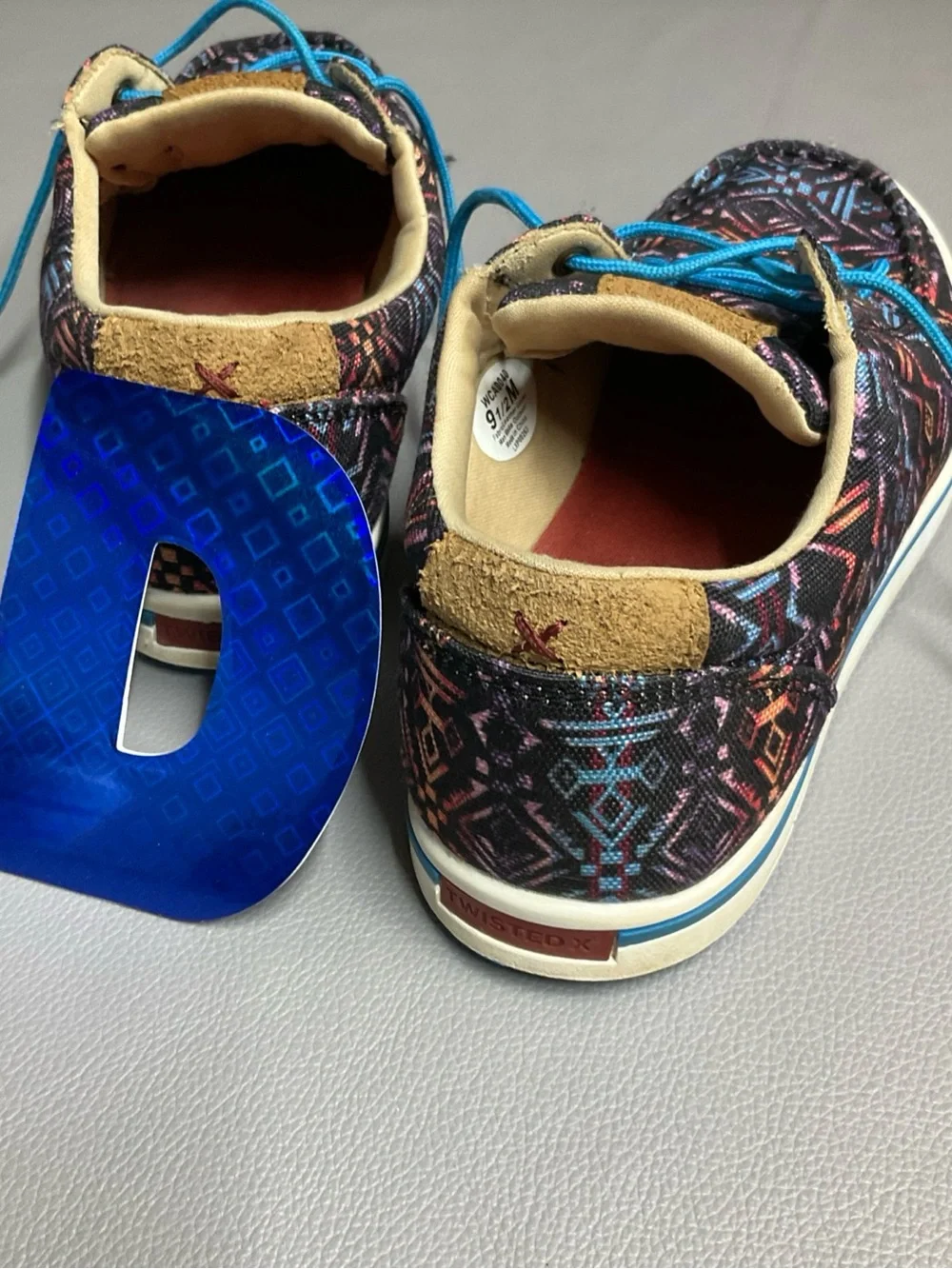 Twisted X Men’s Black Aztec-Print Boat Shoes with Bright Blue Laces